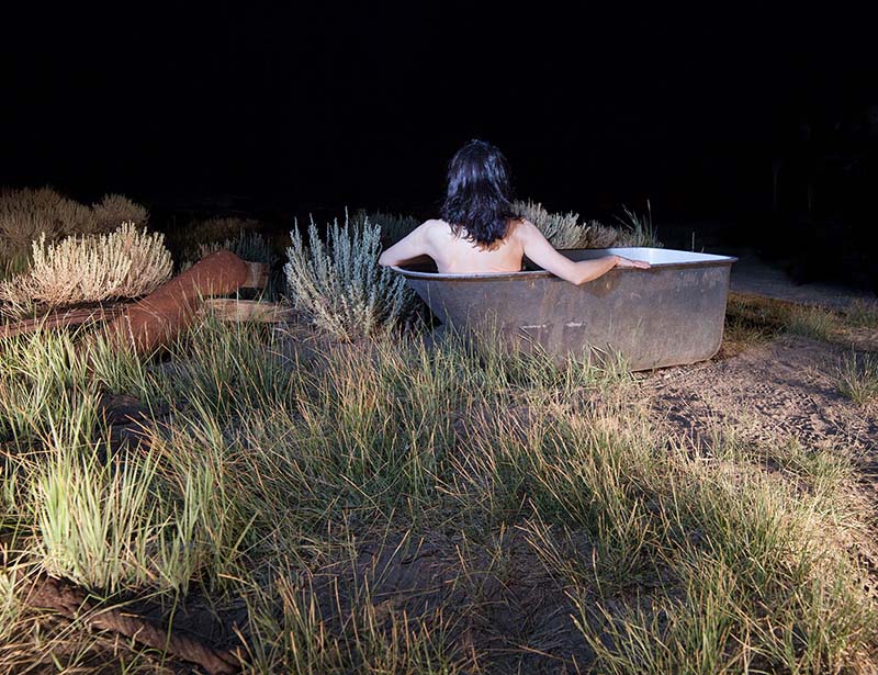 abandoned train under a dramatic full moon